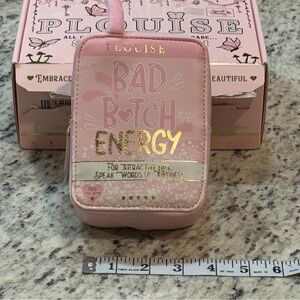 P. Louise. Bad B Energy Pink Pouch with key ring.  Would be cute attached to bag